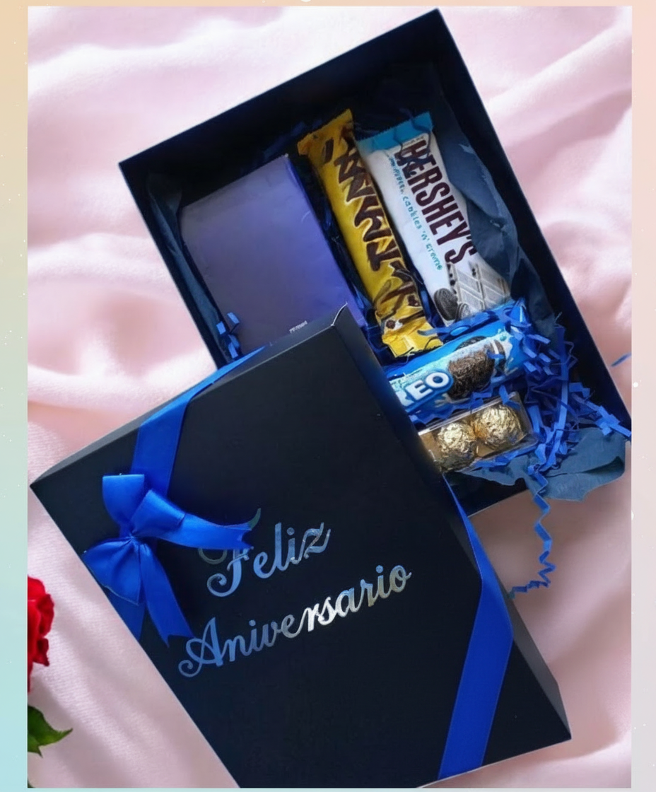 Detalle para caballero con loción (básica) más 3 chocolates Ferrero más 2 chocolates.