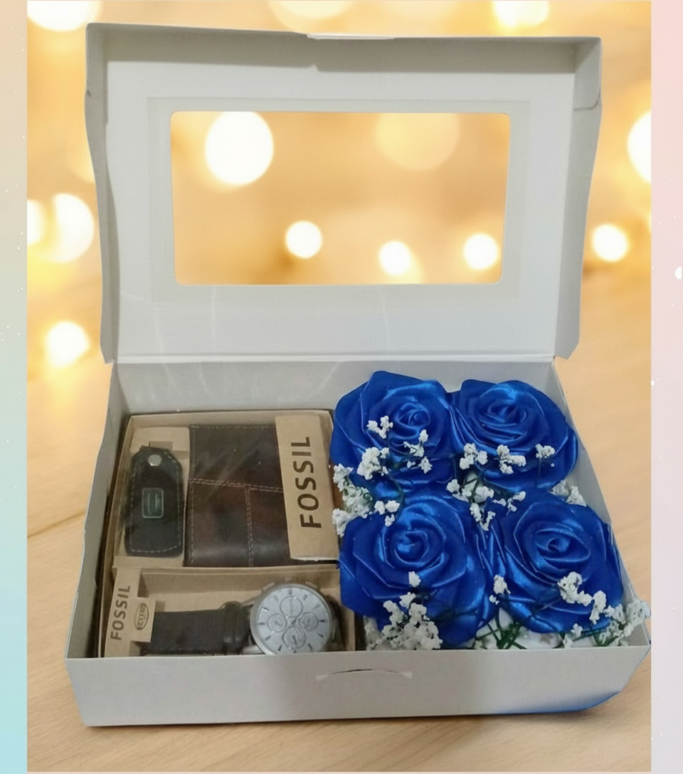 Detalle para caballero con sets e cartera/reloj, más 4 rosas eternas.