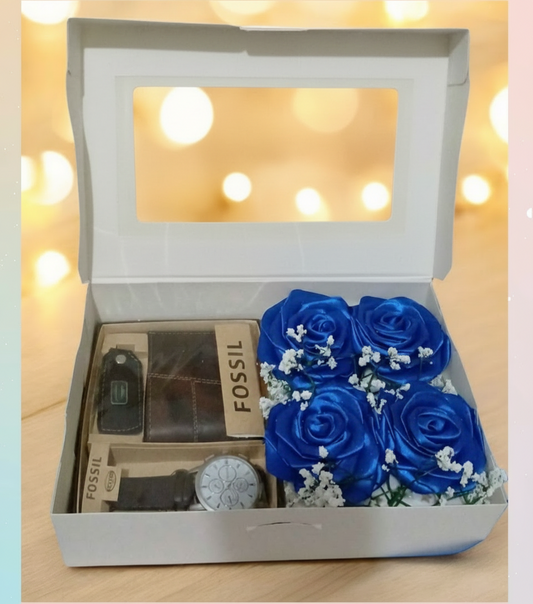 Detalle para caballero con sets e cartera/reloj, más 4 rosas eternas.